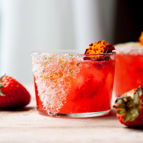 Strawberry Margarita on the rocks with citrus salt rim