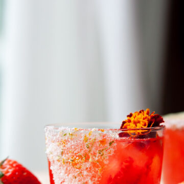 Strawberry Margarita on the rocks with citrus salt rim