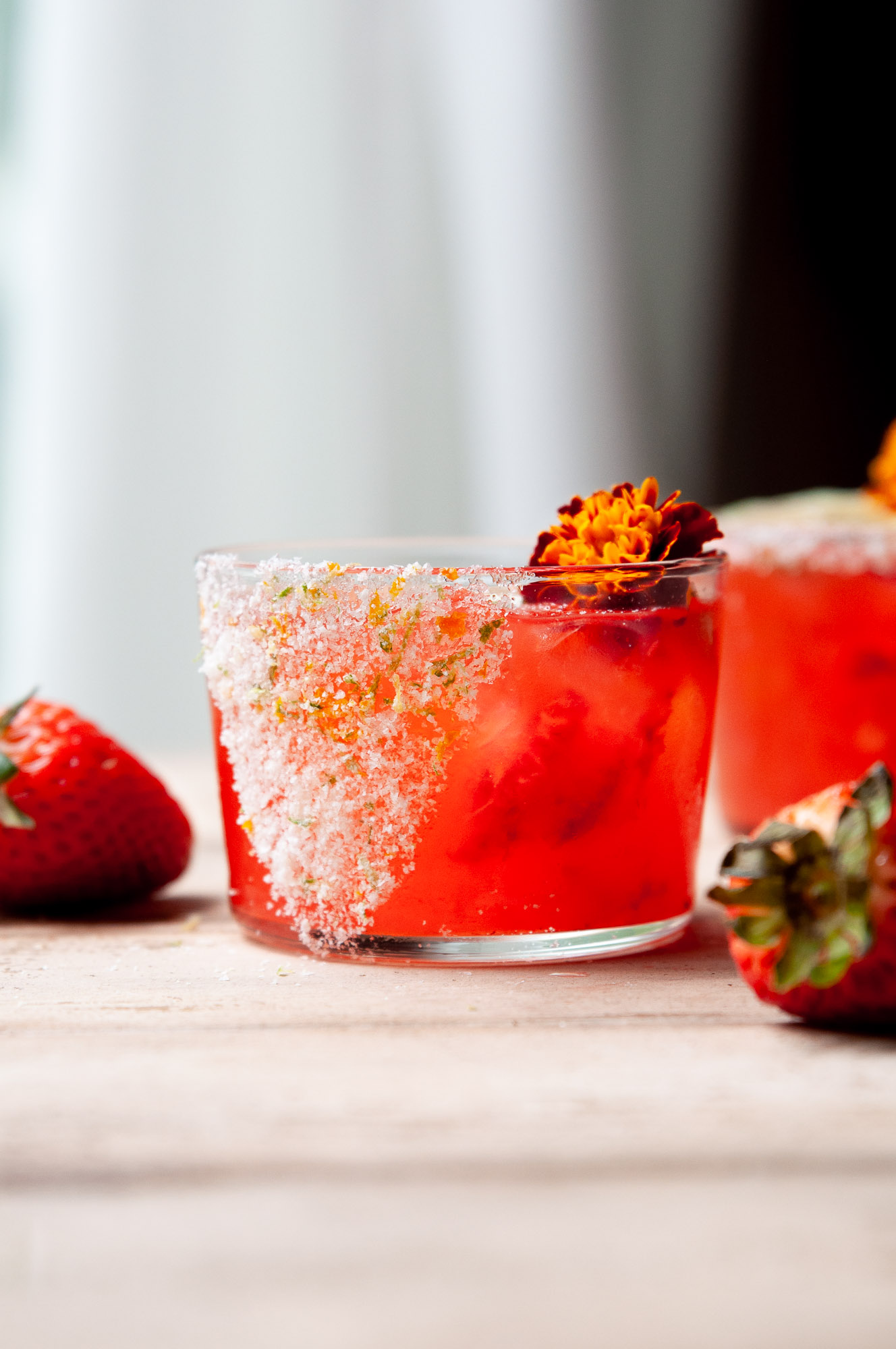 Strawberry Margarita on the rocks with citrus salt rim