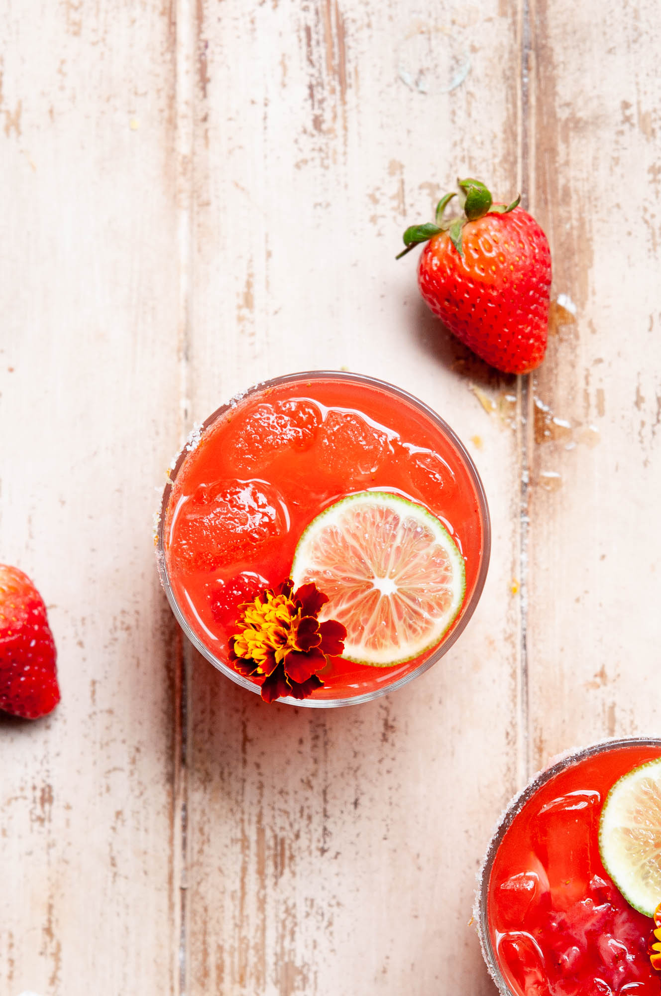 Strawberry Margarita with lime garnish top view