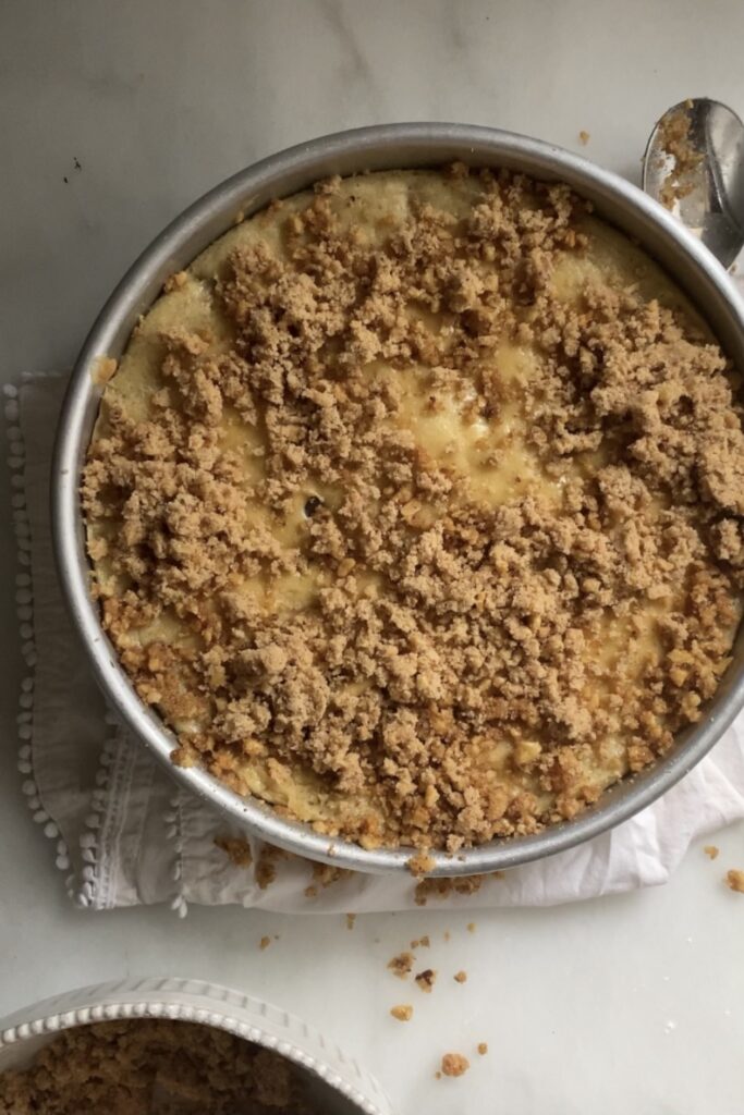 adding crumble topping
