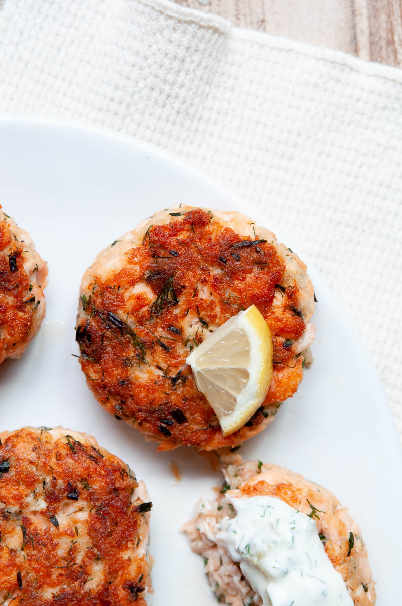 beautiful browned salmon patties on plate