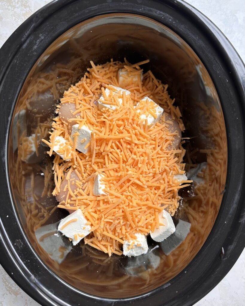 cheese over chicken in crockpot