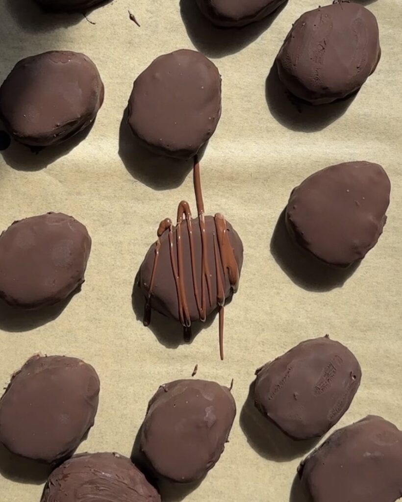 dipped eggs with chocolate drizzle